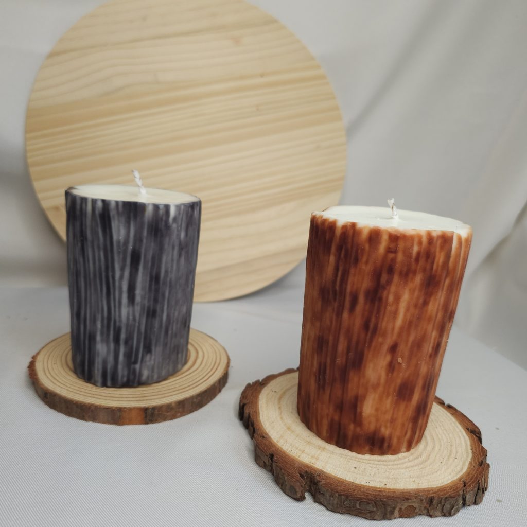 Velas decorativas de la Troncos de Luz, colección Sacred Bark con aroma de madera