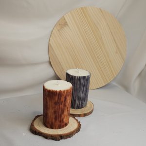 Velas decorativas, Troncos de Luz, con aromas de madera de cedro y sandalo.