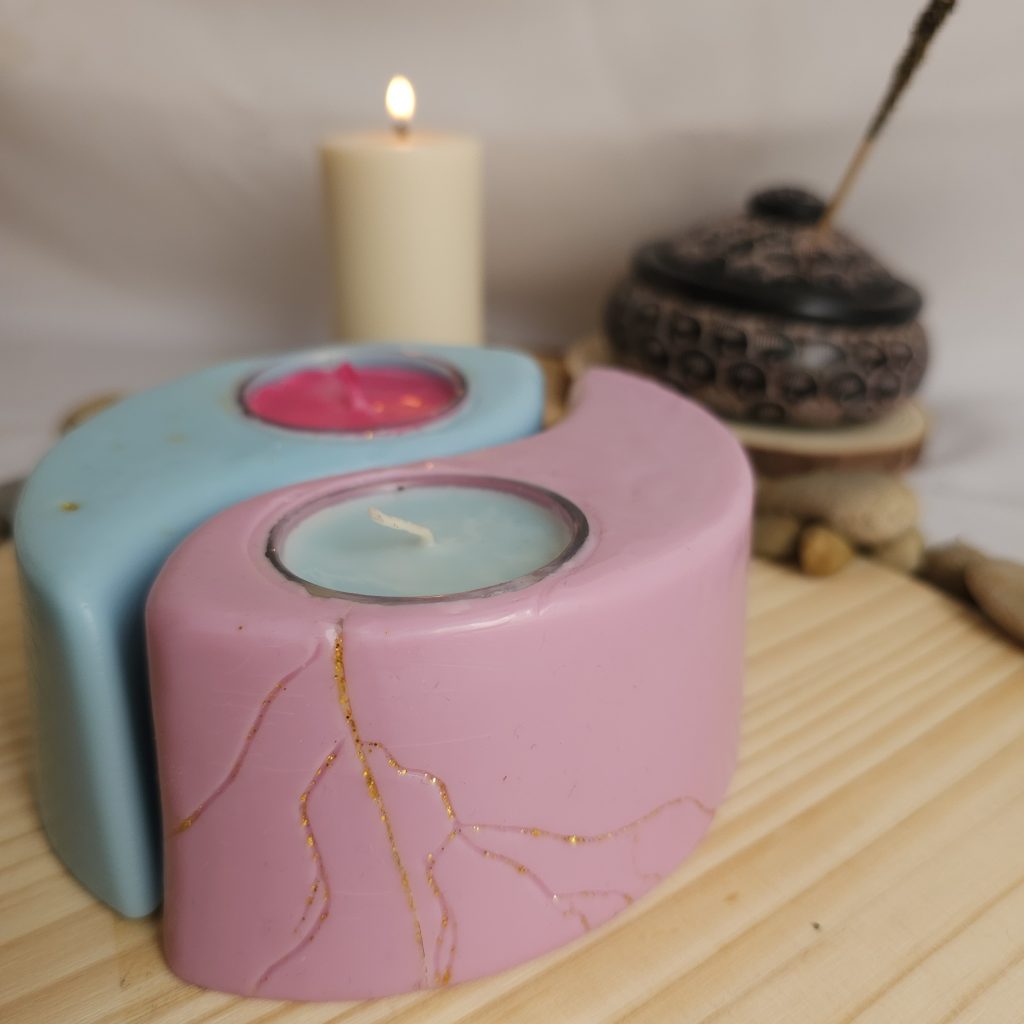 Velas decorativas de yn y yang combinada con técnica Kintsugi en velas.