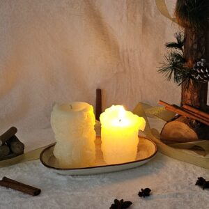 Velas decorativas de invierno, colección Susurro de Invierno - Vela blana encendida